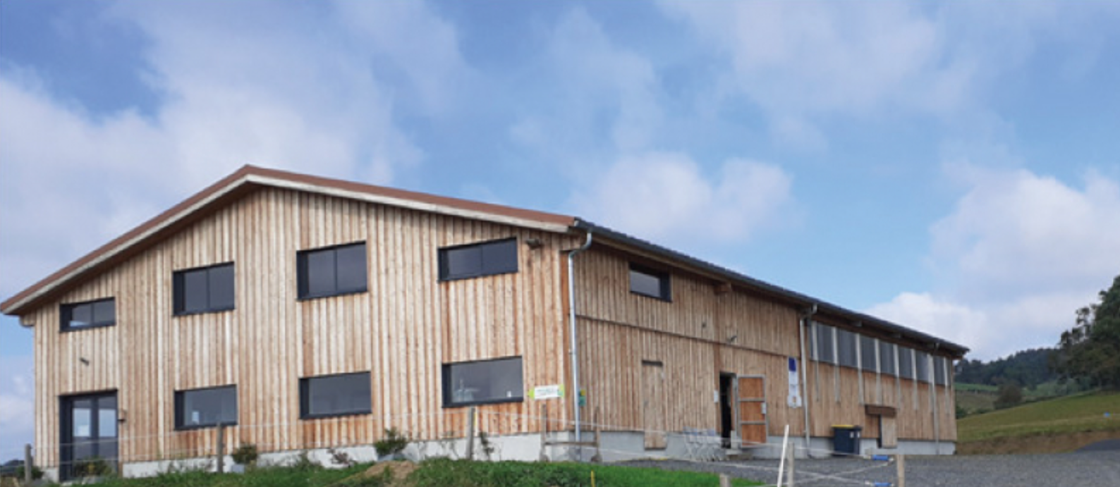 Visite d'un bâtiment agricole en construction bois